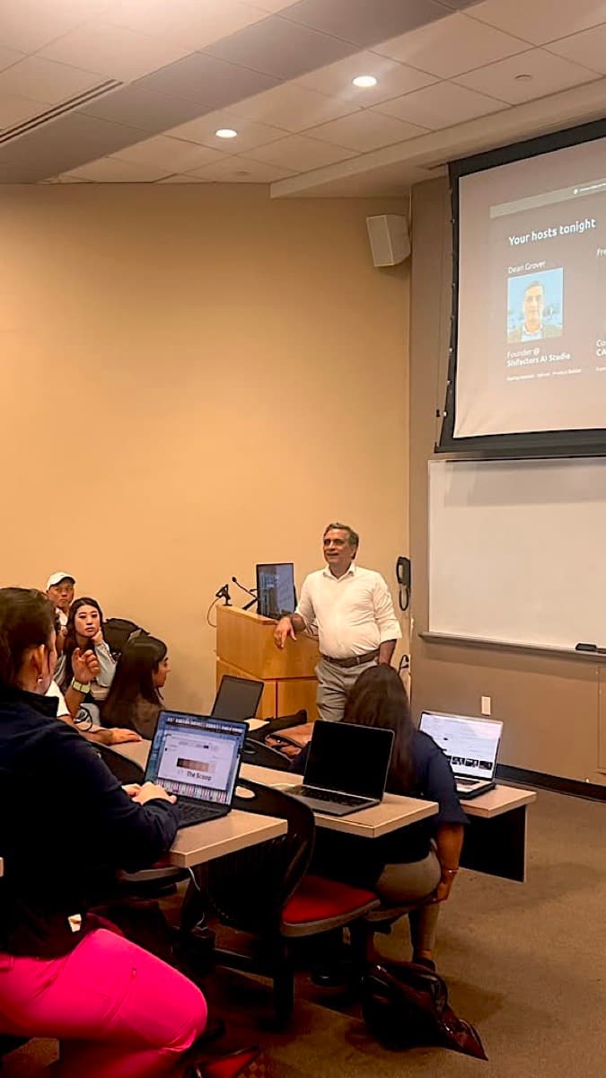 Dean Grover speaking from the podium at the MCP workshop